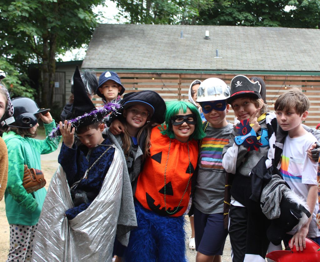a group of kids dressed in costumes