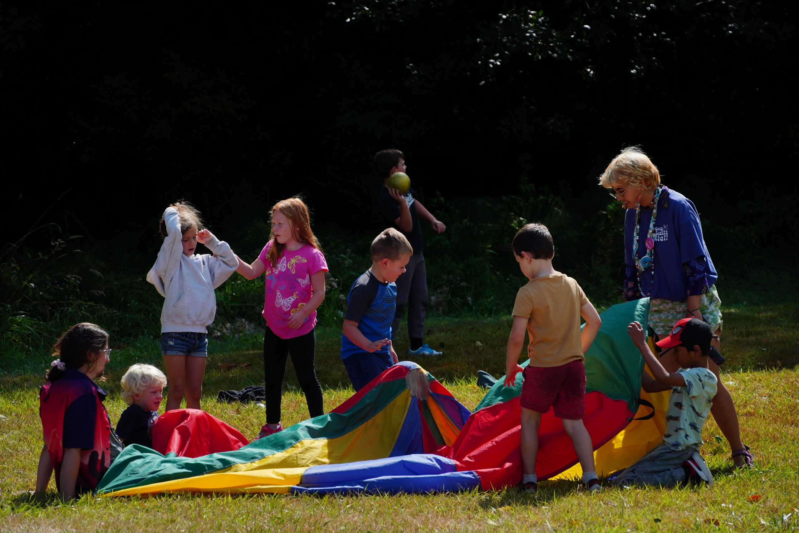 campers playing in field