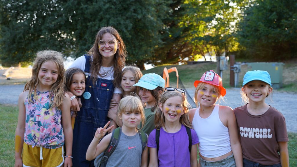 counselor with group of campers