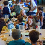 Campers having a meal in Rounds Hall