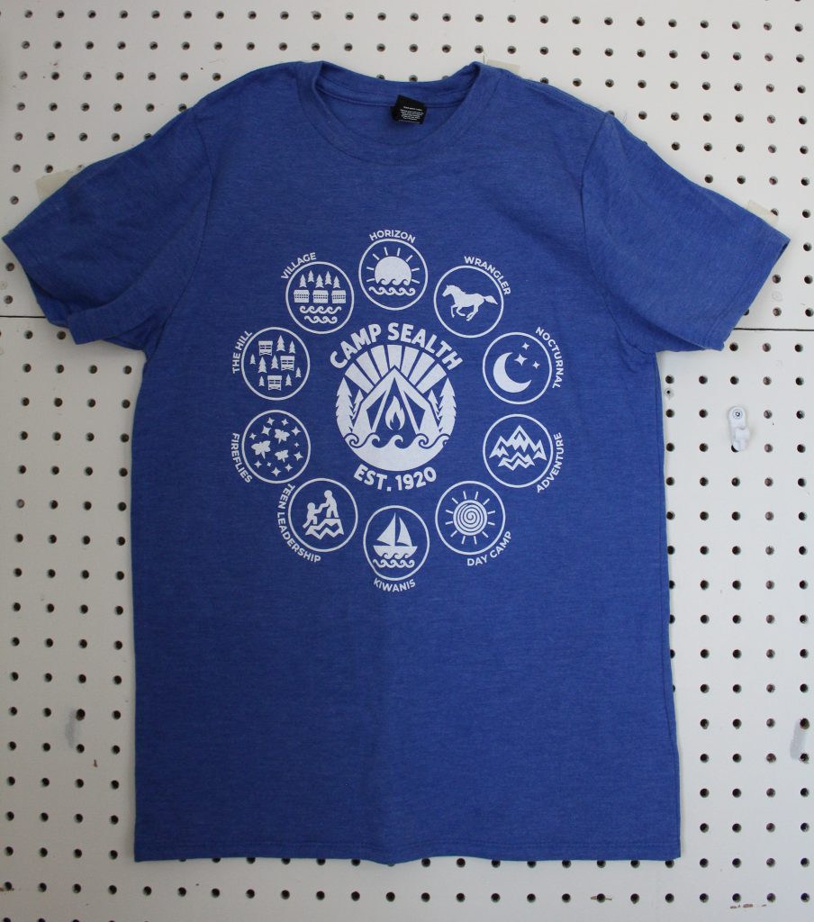 A royal blue t-shirt with Camp Sealth logo