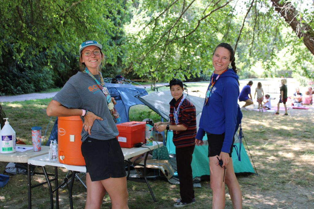 Day Camp staff smiling at the camera