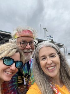 3 people smiling