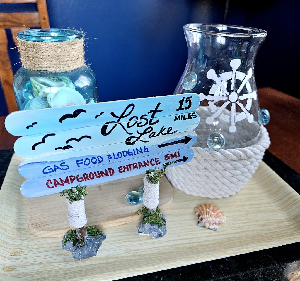 two vases created by wrapping with rope.