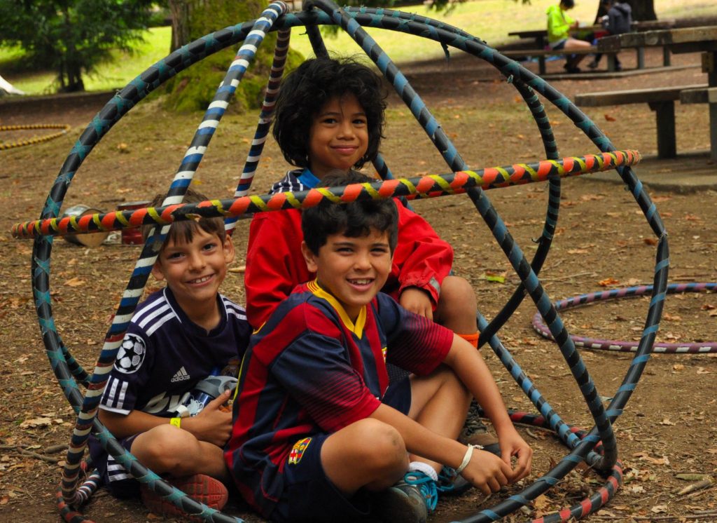 Campers playing with hula hoops at Day Camp