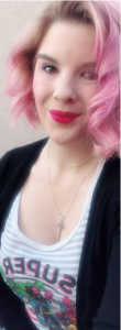headshot of Josie, a woman with blond and pink hair