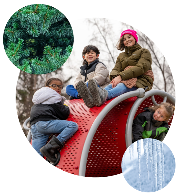 4 children playing on an outdoor play structure